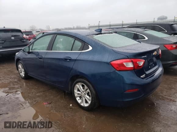 ✅ 2019 Chevrolet Cruze LT • VIN: 1G1BE5SM4K7124928 • Lot: 41740693. Listed on Copart with 75,492 mi. Free auction sales archive from the USA and detailed vehicle history report at DreamBid. Image 2.