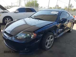 2005 Hyundai Tiburon GT с VIN KMHHN65F35U174645, выставлен на аукционе IAAI как лот 42655120 с пробегом 128 059 миль миль и . История ставок и продаж доступна на DreamBid. Изображение 2.