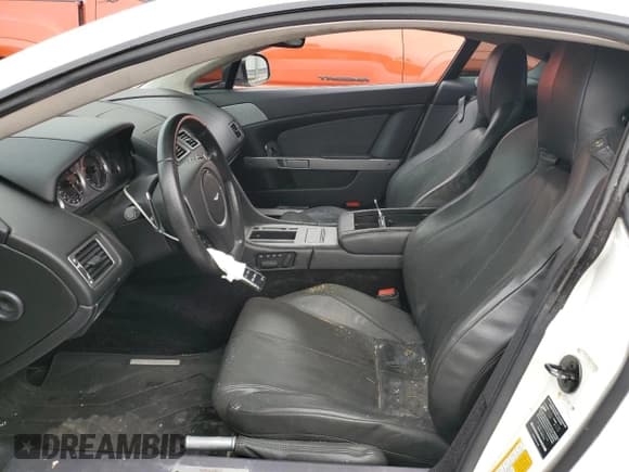 ✅ 2013 Aston Martin Vantage • VIN: SCFEKBAK4DGC17340 • Lot: 85629734. Listed on Copart with 34,975 mi. Free auction sales archive from the USA and detailed vehicle history report at DreamBid. Image 7.