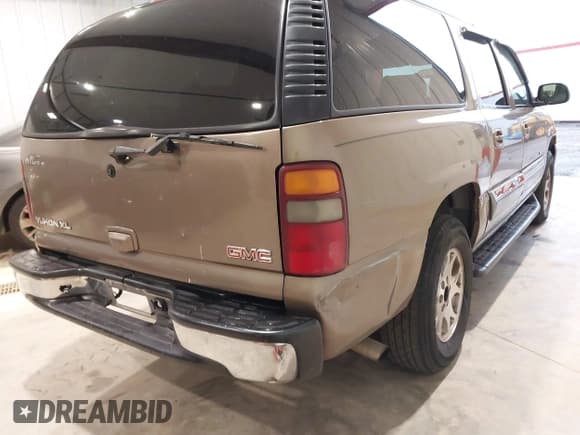✅ 2003 GMC Yukon XL SLT • VIN: 1GKEC16Z73J286909 • Lot: 43731655. Listed on IAAI with 287,998 mi. Free auction sales archive from the USA and detailed vehicle history report at DreamBid. Image 4.