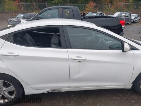 ✅ 2013 Hyundai Elantra GLS • VIN: 5NPDH4AE8DH422215 • Lot: 43422556. Listed on IAAI with 105,201 mi. Free auction sales archive from the USA and detailed vehicle history report at DreamBid. Image 12.