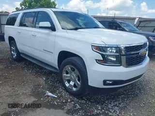 2015 Chevrolet Suburban LT z VIN 1GNSKJKC0FR656971, wystawiony jako IAAI lot #42773722 z przebiegiem 189 195 mil mil oraz . Historia ofert i sprzedaży dostępna na DreamBid. Obrazek 1.