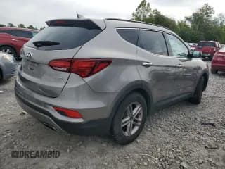 ✅ 2017 Hyundai Santa Fe 2.4L • VIN: 5XYZU3LBXHG445703 • Лот: 69723184. Опубликован ранее на Copart с пробегом 110 282 миль. Бесплатный доступ к архиву аукционных продаж из США и подробный отчёт об истории автомобиля на DreamBid. Изображение 3.