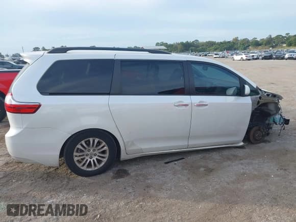 ✅ 2016 Toyota Sienna XLE • VIN: 5TDYK3DC9GS723758 • Lot: 43630852. Listed on IAAI with 143,860 mi. Free auction sales archive from the USA and detailed vehicle history report at DreamBid. Image 14.