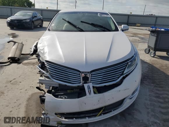 ✅ 2016 Lincoln MKZ • VIN: 3LN6L2G9XGR632690 • Lot: 52902995. Wystawiony na Copart z przebiegiem Nie podano. Bezpłatny archiwum sprzedaży aukcyjnych z USA i szczegółowy raport historii pojazdu na DreamBid. Zdjęcie 5.