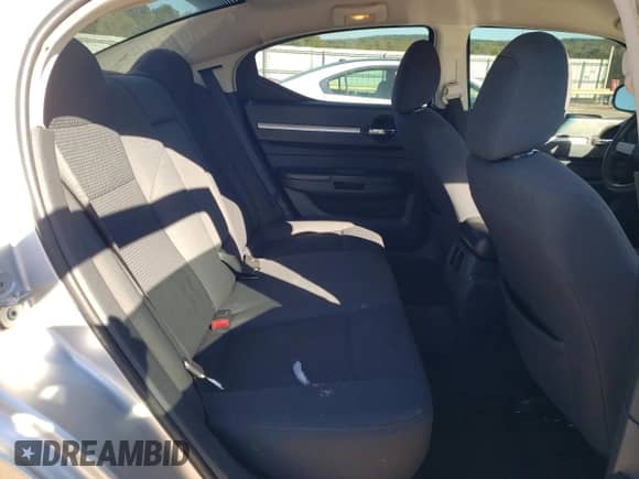 2010 Dodge Charger SXT z VIN 2B3CA3CV7AH285801, wystawiony jako Copart lot #75801874 z przebiegiem 221 337 mil mil oraz Szkoda całkowita • Salvage title. Historia ofert i sprzedaży dostępna na DreamBid. Obrazek 10.