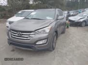 ✅ 2014 Hyundai Santa Fe • VIN: 5XYZUDLB0EG150479 • Lot: 43361152. Listed on IAAI with 163,969 mi. Free auction sales archive from the USA and detailed vehicle history report at DreamBid. Image 17.