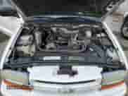 2004 Chevrolet Blazer Fleet z VIN 1GNCS13X64K157331, wystawiony jako Copart lot #42948805 z przebiegiem 124 006 mil mil oraz Szkoda całkowita • Salvage title. Historia ofert i sprzedaży dostępna na DreamBid. Obrazek 12.