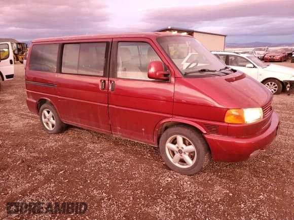 ✅ 2003 Volkswagen EuroVan GLS • VIN: WV2KB47093H015569 • Lot: 81954144. Listed on Copart with 166,304 mi. Free auction sales archive from the USA and detailed vehicle history report at DreamBid. Image 4.