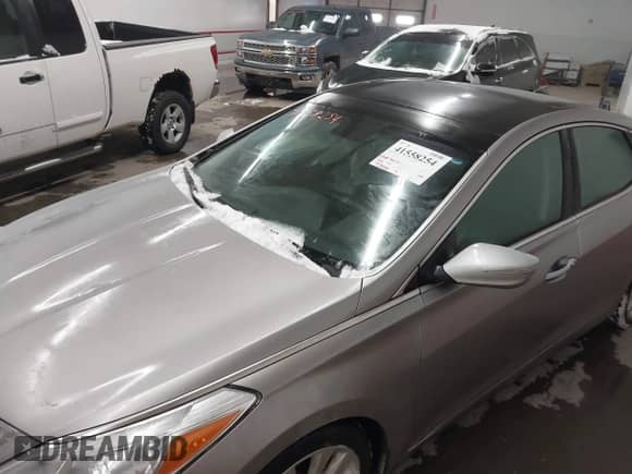 2013 Hyundai Azera с VIN KMHFH4JG2DA225778, выставлен на аукционе IAAI как лот 41558254 с пробегом 158 888 миль миль и . История ставок и продаж доступна на DreamBid. Изображение 6.