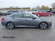 ✅ 2018 Honda Civic EX-T • VIN: JHMFC1F30JX043947 • Lot: 43563584. Listed on IAAI with 145,000 mi. Free auction sales archive from the USA and detailed vehicle history report at DreamBid. Image 14.