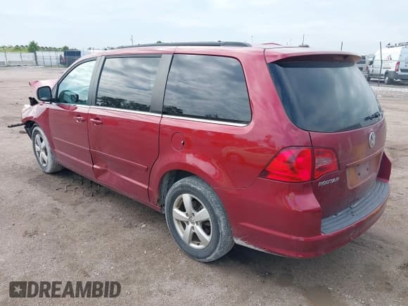 ✅ 2011 Volkswagen Routan SE • VIN: 2V4RW3DG4BR636014 • Lot: 42452137. Listed on IAAI with 203,029 mi. Free auction sales archive from the USA and detailed vehicle history report at DreamBid. Image 3.