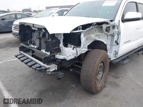 ✅ 2023 Toyota Tacoma SR5 • VIN: 3TMDZ5BN9PM169017 • Lot: 42724717. Listed on IAAI with 28,467 mi. Free auction sales archive from the USA and detailed vehicle history report at DreamBid. Image 6.