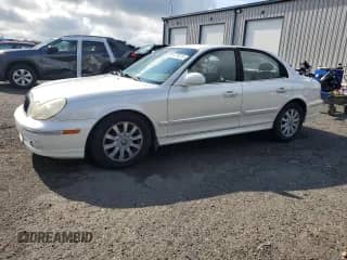 2003 Hyundai Sonata GLS с VIN KMHWF35H23A873106, выставлен на аукционе Copart как лот 64790315 с пробегом 164 238 миль миль и Списание • Salvage title. История ставок и продаж доступна на DreamBid. Изображение 1.