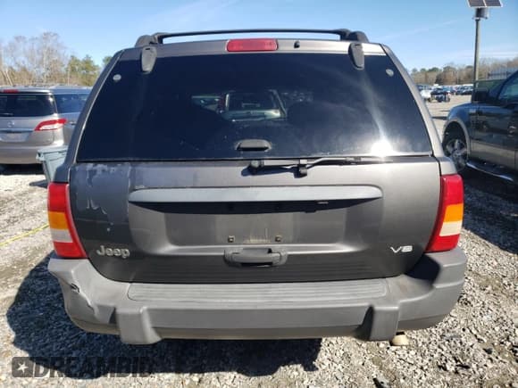 ✅ 2004 Jeep Grand Cherokee Laredo • VIN: 1J4GX48N14C435481 • Lot: 87855975. Listed on Copart with 176,273 mi. Free auction sales archive from the USA and detailed vehicle history report at DreamBid. Image 6.