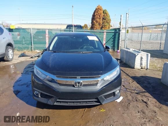 ✅ 2017 Honda Civic Touring • VIN: 19XFC1F99HE025978 • Lot: 43544695. Listed on IAAI with 123,323 mi. Free auction sales archive from the USA and detailed vehicle history report at DreamBid. Image 13.
