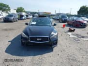 ✅ 2014 Infiniti Q50 Hybrid Premium • VIN: JN1AV7ARXEM702681 • Lot: 42602182. Listed on IAAI with 105,841 mi. Free auction sales archive from the USA and detailed vehicle history report at DreamBid. Image 12.