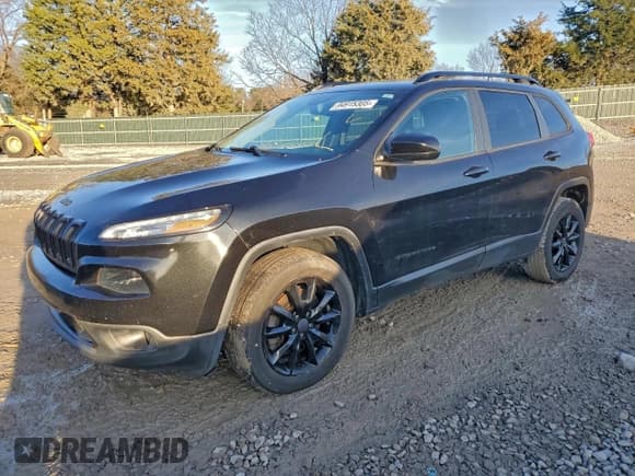 ✅ 2014 Jeep Cherokee Latitude • VIN: 1C4PJMCS4EW309099 • Lot: 94915305. Listed on Copart with 138,612 mi. Free auction sales archive from the USA and detailed vehicle history report at DreamBid. Image 1.