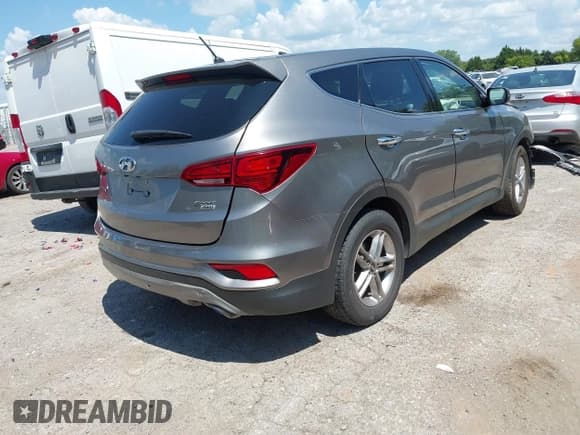 ✅ 2018 Hyundai Santa Fe 2.4L • VIN: 5NMZTDLB4JH107766 • Лот: 43043034. Опубликован ранее на IAAI с пробегом 93 208 миль. Бесплатный доступ к архиву аукционных продаж из США и подробный отчёт об истории автомобиля на DreamBid. Изображение 4.