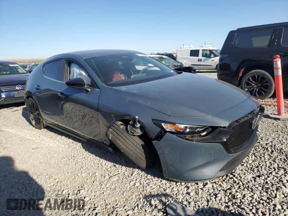 ✅ 2024 Mazda 3 S Carbon Edition • VIN: JM1BPBLM4R1714705 • Lot: 69140474. Listed on Copart with 1,808 mi. Free auction sales archive from the USA and detailed vehicle history report at DreamBid. Image 4.