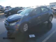 ✅ 2014 Chevrolet Cruze LS • VIN: 1G1PA5SHXE7464206 • Lot: 43599999. Listed on IAAI with 130,122 mi. Free auction sales archive from the USA and detailed vehicle history report at DreamBid. Image 2.