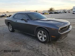 ✅ 2013 Dodge Challenger SXT • VIN: 2C3CDYAG1DH680654 • Lot: 79269494. Wystawiony na Copart z przebiegiem 145 371 mil. Bezpłatny archiwum sprzedaży aukcyjnych z USA i szczegółowy raport historii pojazdu na DreamBid. Zdjęcie 4.