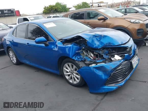 2019 Toyota Camry LE with VIN 4T1B11HK8KU237019, listed as a IAAI auction lot 42170775 with 71,024 mi miles and . Bid and sale history available at DreamBid. Image 1.