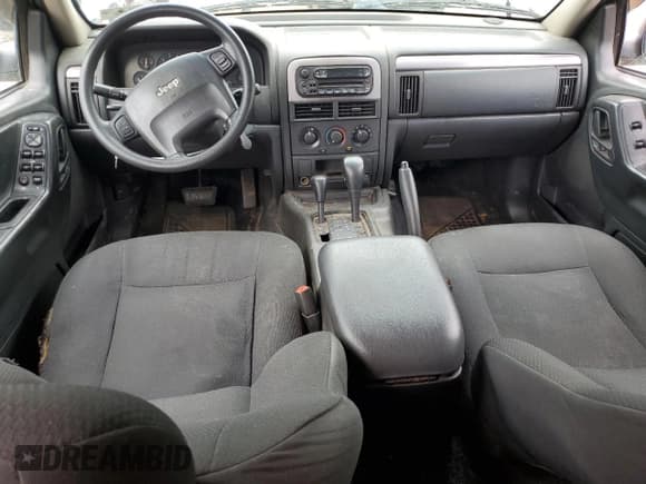 ✅ 2004 Jeep Grand Cherokee Laredo • VIN: 1J4GW48S34C184715 • Лот: 57272955. Опубликован ранее на Copart с пробегом 245 902 миль. Бесплатный доступ к архиву аукционных продаж из США и подробный отчёт об истории автомобиля на DreamBid. Изображение 8.