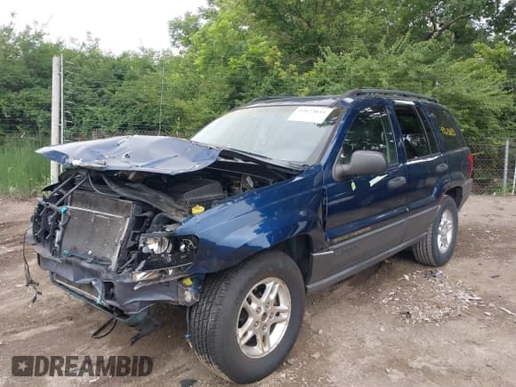 ✅ 2002 Jeep Grand Cherokee Laredo • VIN: 1J4GW48S92C107151 • Lot: 42673835. Wystawiony na IAAI z przebiegiem 222 657 mil. Bezpłatny archiwum sprzedaży aukcyjnych z USA i szczegółowy raport historii pojazdu na DreamBid. Zdjęcie 6.