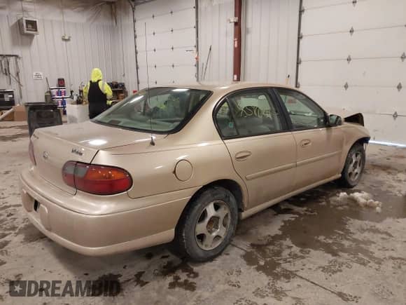 2003 Chevrolet Malibu LS z VIN 1G1NE52J03M680630, wystawiony jako IAAI lot #41585900 z przebiegiem 103 675 mil mil oraz . Historia ofert i sprzedaży dostępna na DreamBid. Obrazek 4.