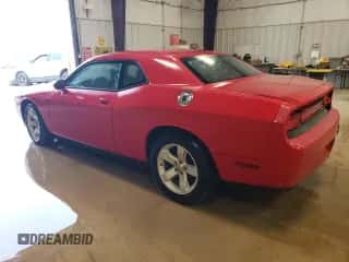 2014 Dodge Challenger SXT z VIN 2C3CDYAG2EH311187, wystawiony jako Copart lot #56570074 z przebiegiem 113 604 mil mil oraz Czysty tytuł • Clean title. Historia ofert i sprzedaży dostępna na DreamBid. Obrazek 2.