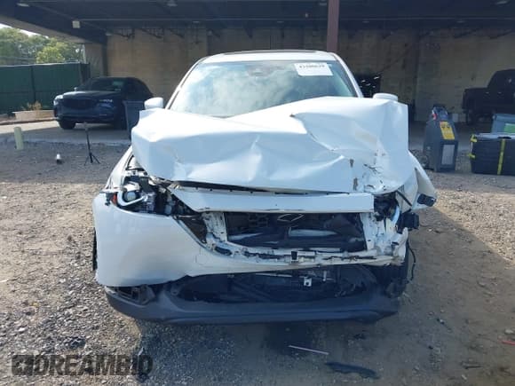 ✅ 2023 Mazda CX-5 S Carbon Edition • VIN: JM3KFBCM3P0271198 • Lot: 43280639. Listed on IAAI with 9,481 mi. Free auction sales archive from the USA and detailed vehicle history report at DreamBid. Image 13.