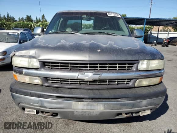 1999 Chevrolet Silverado 1500 LS z VIN 2GCEK19T7X1283465, wystawiony jako Copart lot #69845384 z przebiegiem 438 466 mil mil oraz Szkoda całkowita • Salvage title. Historia ofert i sprzedaży dostępna na DreamBid. Obrazek 5.
