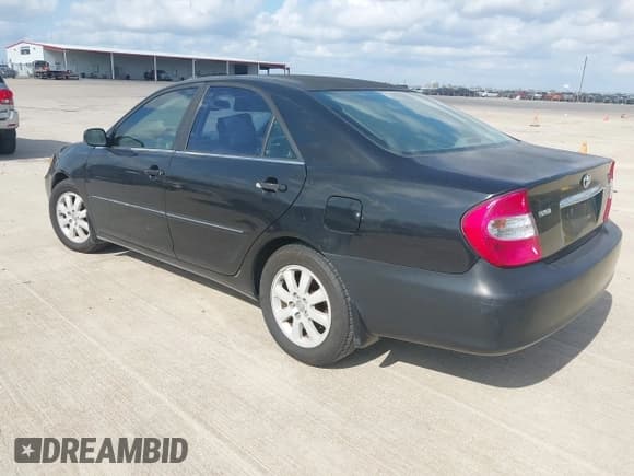 ✅ 2003 Toyota Camry LE • VIN: 4T1BE32K93U257838 • Lot: 43777915. Listed on IAAI with 304,957 mi. Free auction sales archive from the USA and detailed vehicle history report at DreamBid. Image 3.