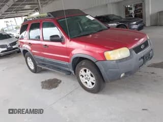 ✅ 2003 Ford Escape XLT Popular • VIN: 1FMYU03173KD91910 • Lot: 43080445. Listed on IAAI with 144,311 mi. Free auction sales archive from the USA and detailed vehicle history report at DreamBid. Image 1.