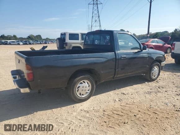 ✅ 1997 Toyota Tacoma • VIN: 4TANL42N2VZ311926 • Lot: 80840185. Wystawiony na Copart z przebiegiem 261 894 mil. Bezpłatny archiwum sprzedaży aukcyjnych z USA i szczegółowy raport historii pojazdu na DreamBid. Zdjęcie 3.