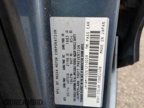 ✅ 2014 Mazda 3 S Touring • VIN: JM1BM1V32E1210039 • Lot: 93205695. Listed on Copart with 161,651 mi. Free auction sales archive from the USA and detailed vehicle history report at DreamBid. Image 12.