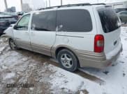 ✅ 2000 Pontiac Montana • VIN: 1GMDX03E8YD100304 • Lot: 41594953. Wystawiony na IAAI z przebiegiem 300 630 mil. Bezpłatny archiwum sprzedaży aukcyjnych z USA i szczegółowy raport historii pojazdu na DreamBid. Zdjęcie 3.