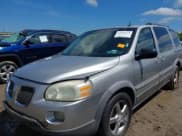 ✅ 2005 Pontiac Montana 1SB • VIN: 1GMDV33L55D169467 • Lot: 42200331. Listed on IAAI with 142,161 mi. Free auction sales archive from the USA and detailed vehicle history report at DreamBid. Image 2.