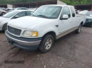 ✅ 2000 Ford F-150 XL • VIN: 2FTRX17L3YCA03228 • Lot: 42262388. Listed on IAAI with 122,929 mi. Free auction sales archive from the USA and detailed vehicle history report at DreamBid. Image 2.