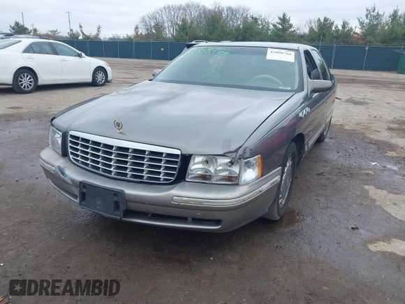 ✅ 1998 Cadillac DeVille • VIN: 1G6KD54Y3WU718026 • Lot: 42008766. Listed on IAAI with 138,035 mi. Free auction sales archive from the USA and detailed vehicle history report at DreamBid. Image 2.