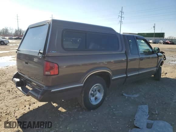 1997 Chevrolet S-10 LS с VIN 1GCCS1945V8158538, выставлен на аукционе Copart как лот 82390784 с пробегом 41 228 миль миль и Списание • Salvage title. История ставок и продаж доступна на DreamBid. Изображение 3.