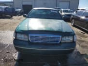 ✅ 2000 Ford Crown Victoria • VIN: 2FAFP73W8YX141772 • Lot: 75394894. Listed on Copart with 190,123 mi. Free auction sales archive from the USA and detailed vehicle history report at DreamBid. Image 5.