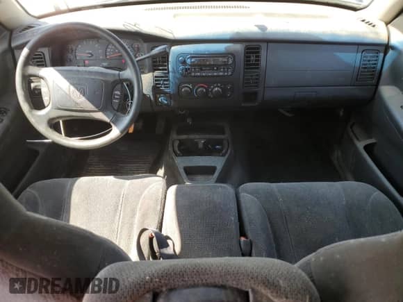 2003 Dodge Dakota Sport z VIN 1D7HG38N13S101403, wystawiony jako Copart lot #50814875 z przebiegiem 15 396 mil mil oraz Czysty tytuł • Clean title. Historia ofert i sprzedaży dostępna na DreamBid. Obrazek 8.