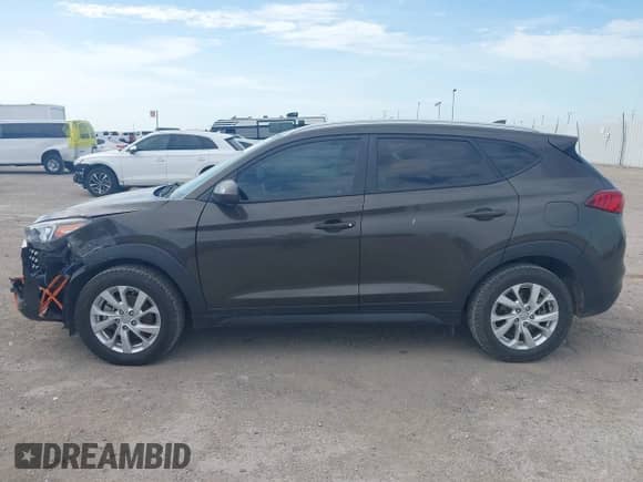 2019 Hyundai Tucson Value with VIN KM8J33A45KU047465, listed as a IAAI auction lot 42625120 with 136,962 mi miles and . Bid and sale history available at DreamBid. Image 14.