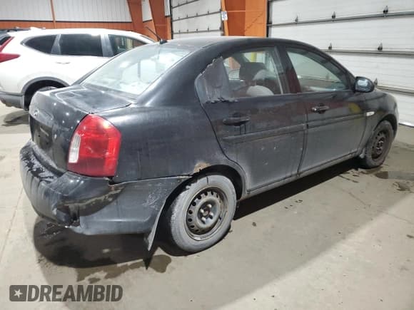 ✅ 2007 Hyundai Accent GL • VIN: KMHCN45C87U142295 • Лот: 86149894. Опубликован ранее на Copart с пробегом 325 738 миль. Бесплатный доступ к архиву аукционных продаж из США и подробный отчёт об истории автомобиля на DreamBid. Изображение 3.