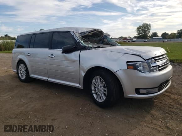 ✅ 2015 Ford Flex SEL • VIN: 2FMGK5C82FBA19515 • Lot: 71609565. Listed on Copart with 135,824 mi. Free auction sales archive from the USA and detailed vehicle history report at DreamBid. Image 4.