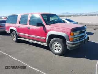 1994 Chevrolet Suburban z VIN 1GNFK16K9RJ334433, wystawiony jako IAAI lot #43559913 z przebiegiem 322 899 mil mil oraz . Historia ofert i sprzedaży dostępna na DreamBid. Obrazek 1.