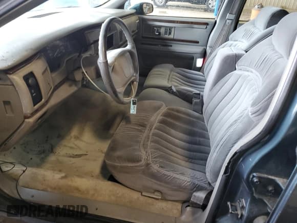 ✅ 1994 Buick Roadmaster • VIN: 1G4BN52P1RR421828 • Lot: 62710145. Listed on Copart with 130,889 mi. Free auction sales archive from the USA and detailed vehicle history report at DreamBid. Image 7.