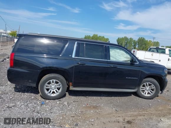 ✅ 2015 Chevrolet Suburban LT • VIN: 1GNSKJKC5FR688637 • Lot: 43232837. Listed on IAAI with 267,129 mi. Free auction sales archive from the USA and detailed vehicle history report at DreamBid. Image 13.
